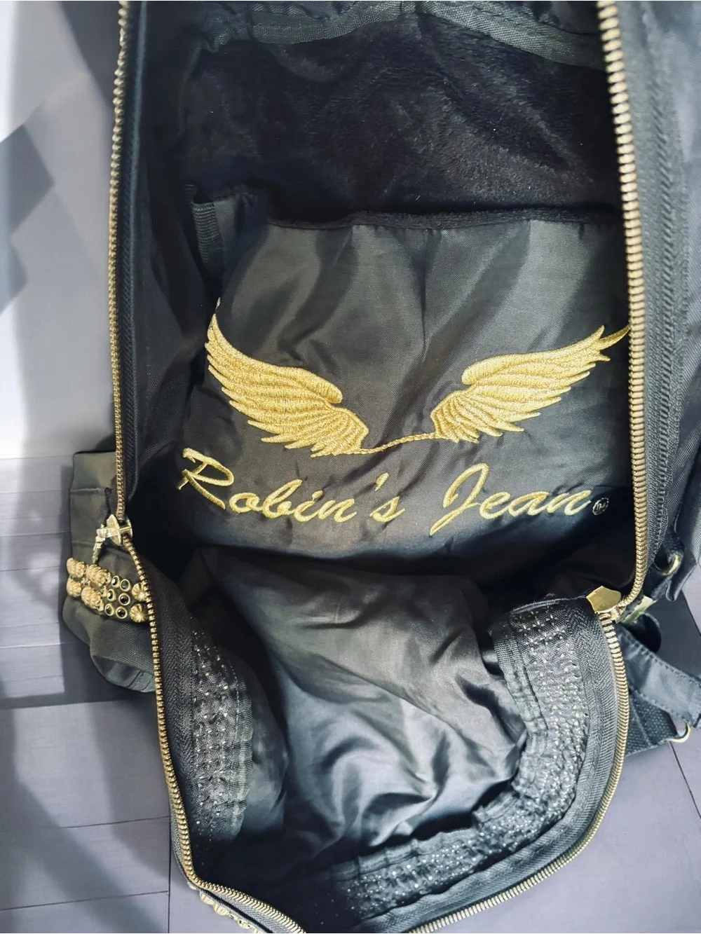 Jean Studded Backpack designed with an edgy  streetwear aesthetic.